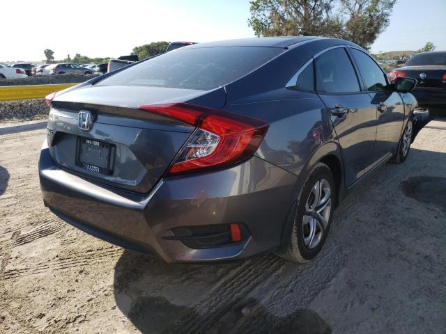 Photo 4 from auction – 2018 HONDA CIVIC LX with VIN 19XFC2F52JE002065