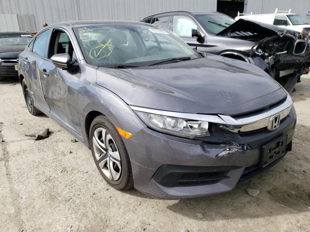 HONDA CIVIC LX 2018 with VIN 2HGFC2F55JH589447 - Photo from auction