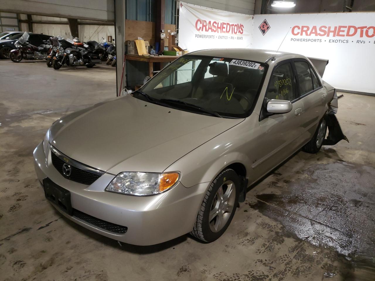 Photo 2 from auction – 2002 MAZDA PROTEGE DX with VIN JM1BJ226920510160