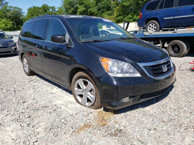 HONDA ODYSSEY 2010 with VIN 5FNRL3H94AB083664 - Photo from auction