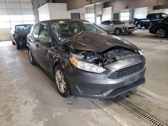 FORD FOCUS SE 2018 with VIN 1FADP3K20JL212478 - Photo from auction