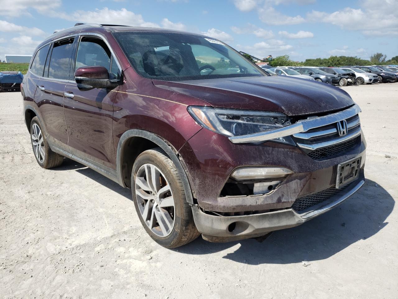 HONDA PILOT TOUR 2017 with VIN 5FNYF6H98HB073928 - Photo from auction