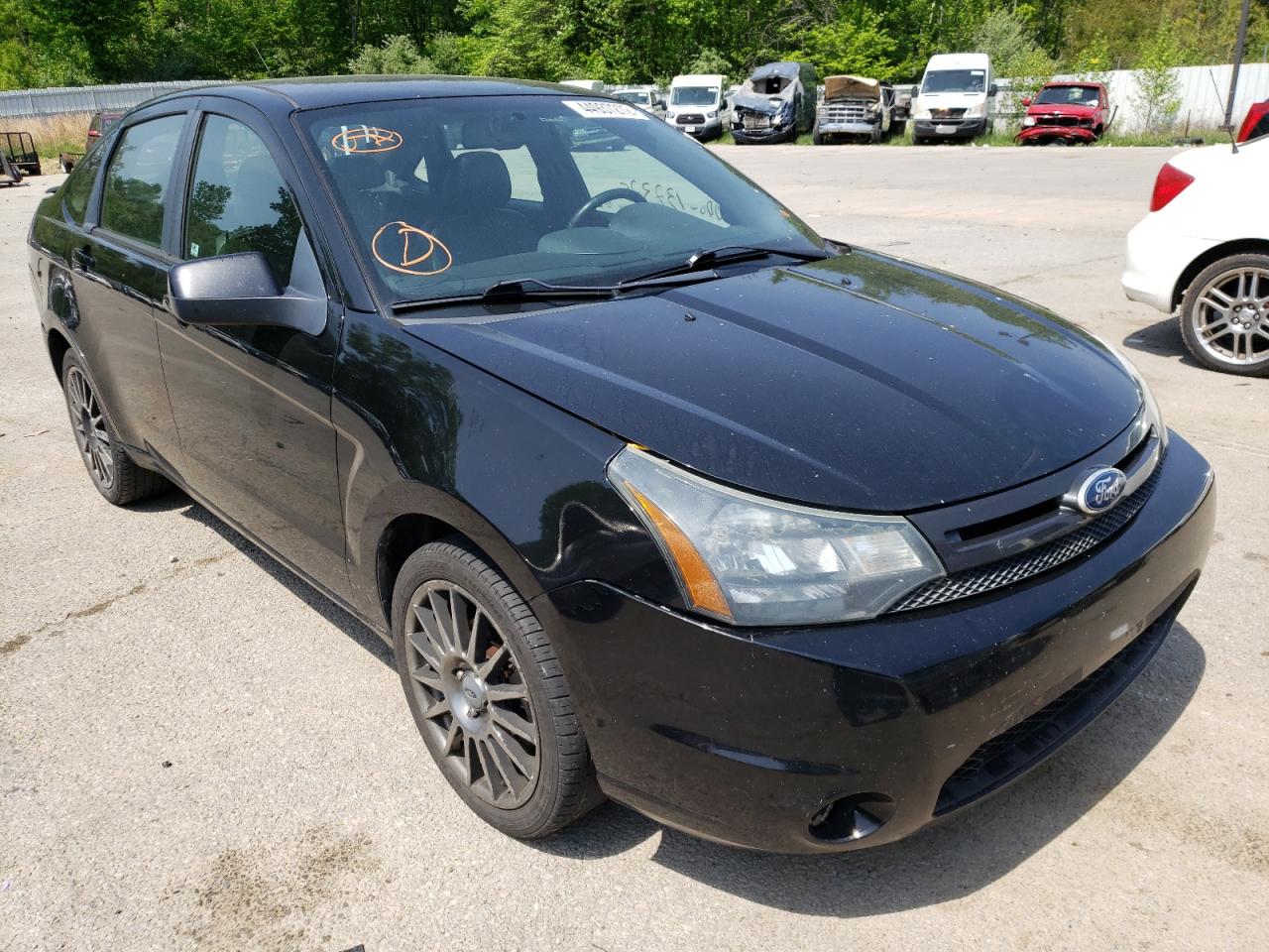 FORD FOCUS SES 2011 with VIN 1FAHP3GN9BW113775 - Photo from auction