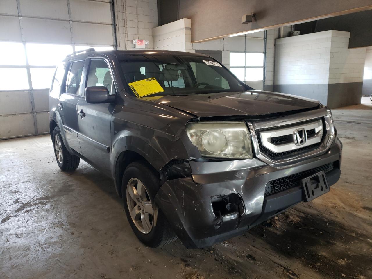 HONDA PILOT EXL 2011 with VIN 5FNYF4H51BB026717 - Photo from auction