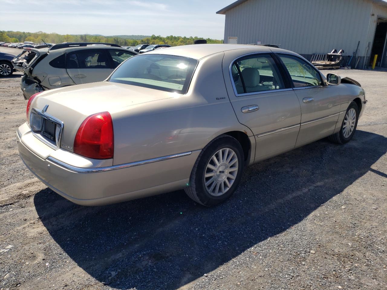 Photo 4 from auction – 2004 LINCOLN TOWN CAR E with VIN 1LNHM81W34Y614827