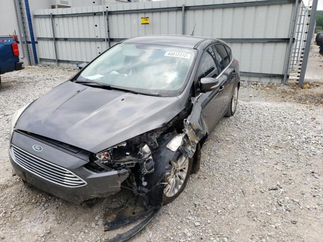 Photo 2 from auction – 2016 FORD FOCUS TITA with VIN 1FADP3N28GL330427