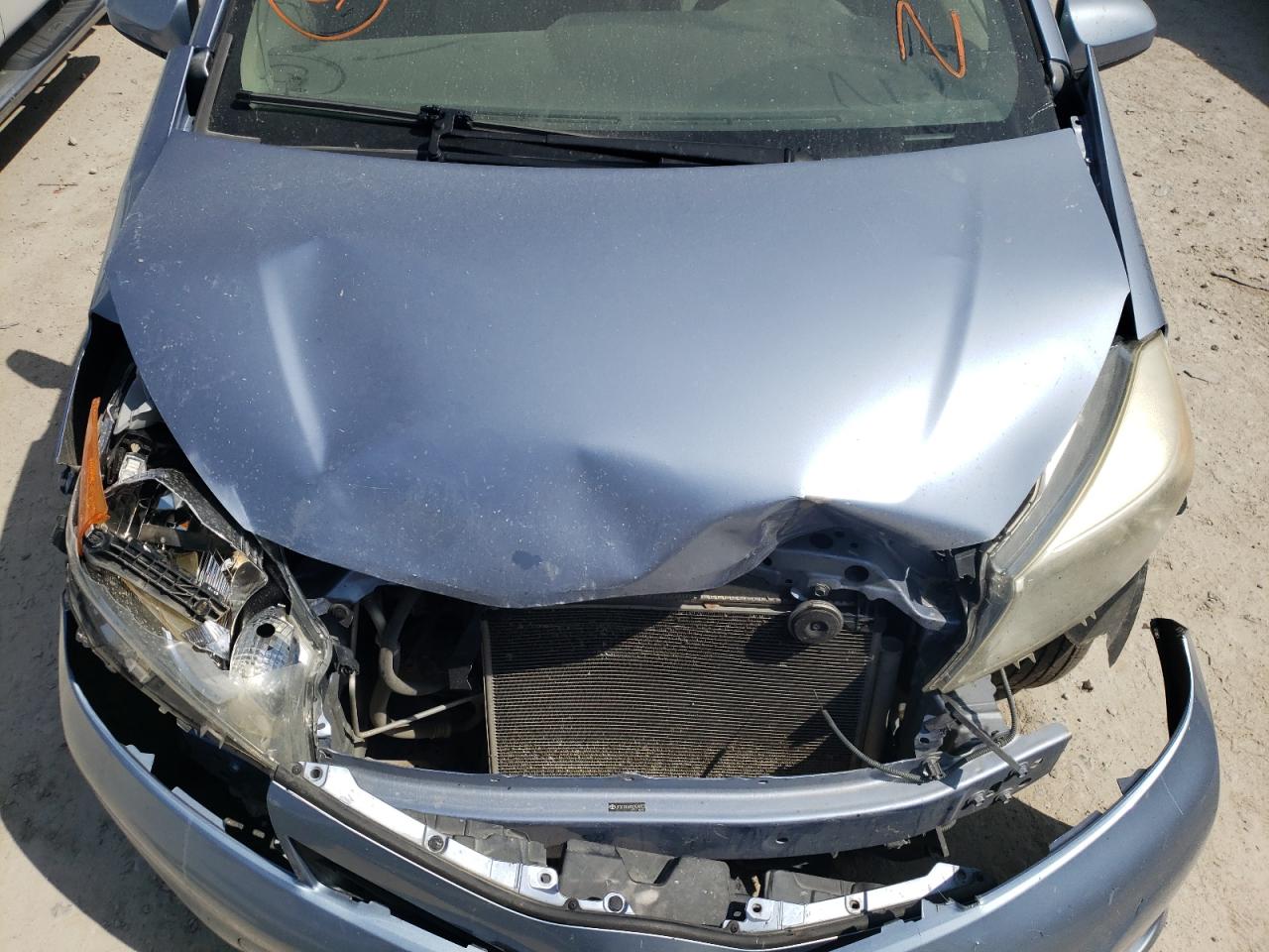 Photo 7 from auction – 2012 TOYOTA YARIS with VIN JTDKTUD38CD528703
