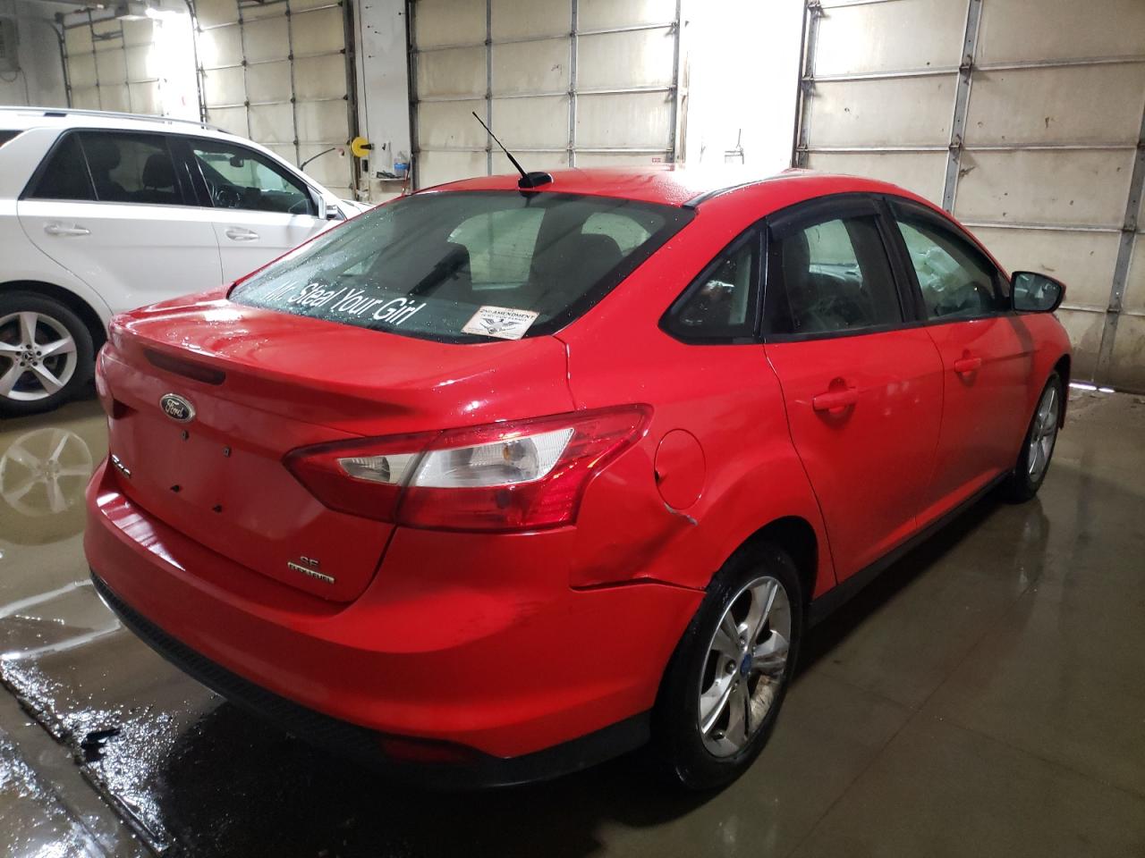 Photo 4 from auction – 2013 FORD FOCUS SE with VIN 1FADP3F27DL272577