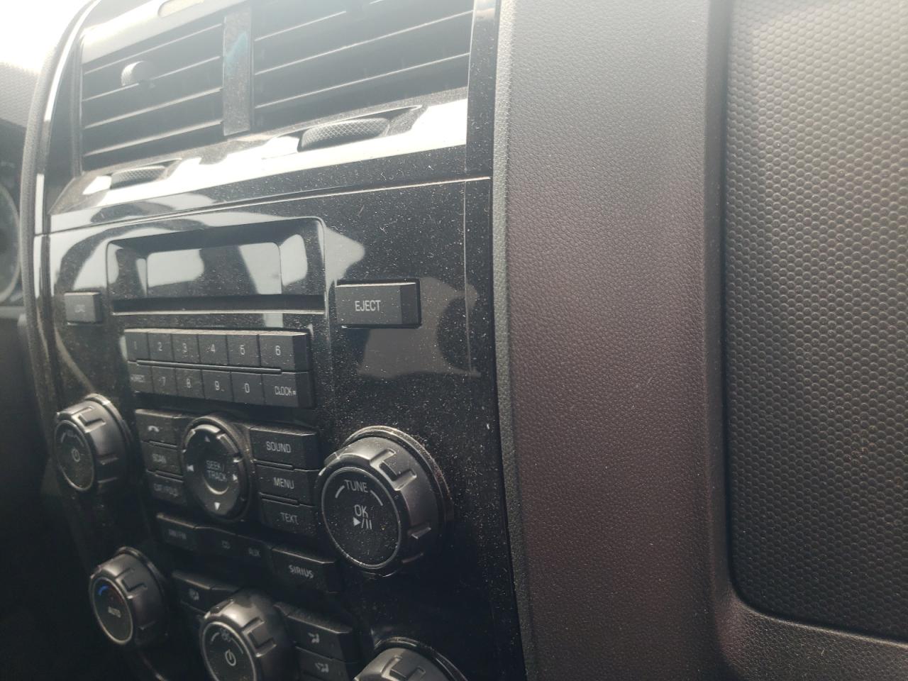 Photo 9 from auction – 2012 FORD ESCAPE LIM with VIN 1FMCU0E7XCKC16255