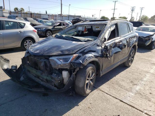 Photo 2 from auction – 2017 TOYOTA RAV4 XLE with VIN JTMWFREV0HJ108576