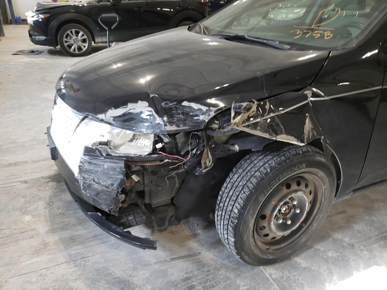 Photo 9 from auction – 2012 KIA FORTE EX with VIN KNAFU4A29C5583758