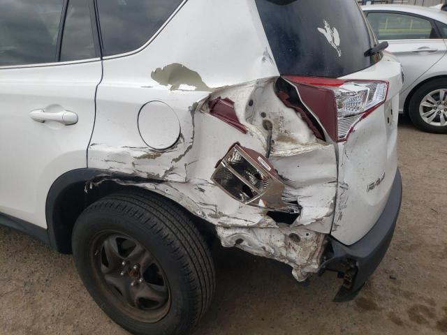 Photo 9 from auction – 2014 TOYOTA RAV4 LE with VIN 2T3BFREV8EW219856