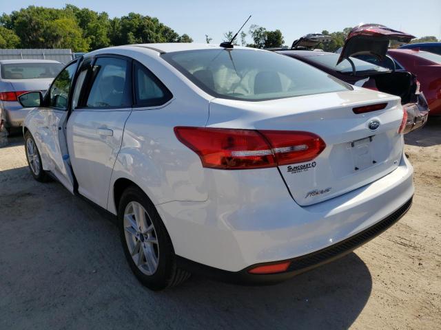 Photo 3 from auction – 2018 FORD FOCUS SE with VIN 1FADP3F21JL263952