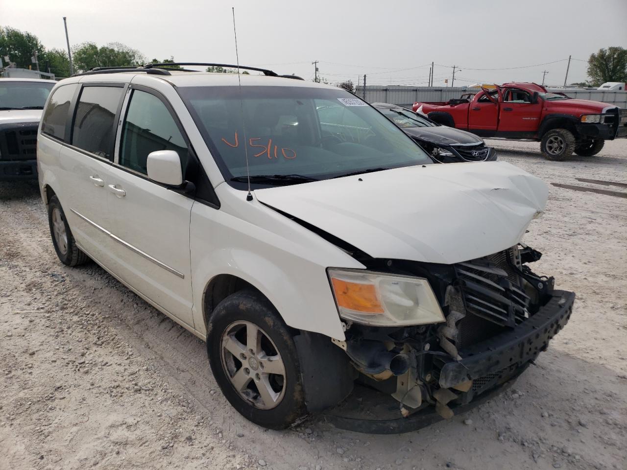 DODGE GRAND CARA 2010 with VIN 2D4RN5D16AR119125 - Photo from auction