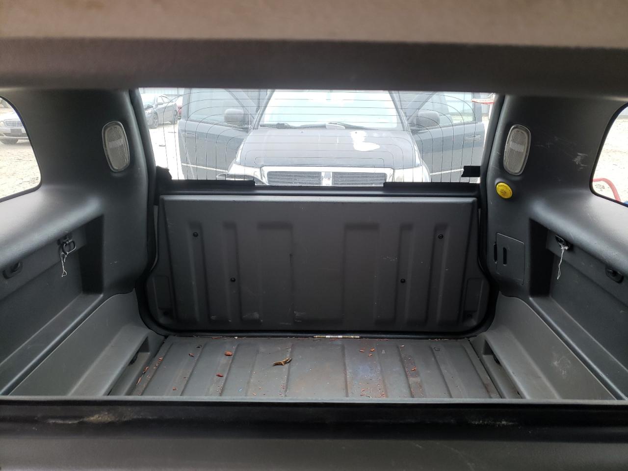 Photo 9 from auction – 2004 GMC ENVOY XUV with VIN 1GKET12S746197399