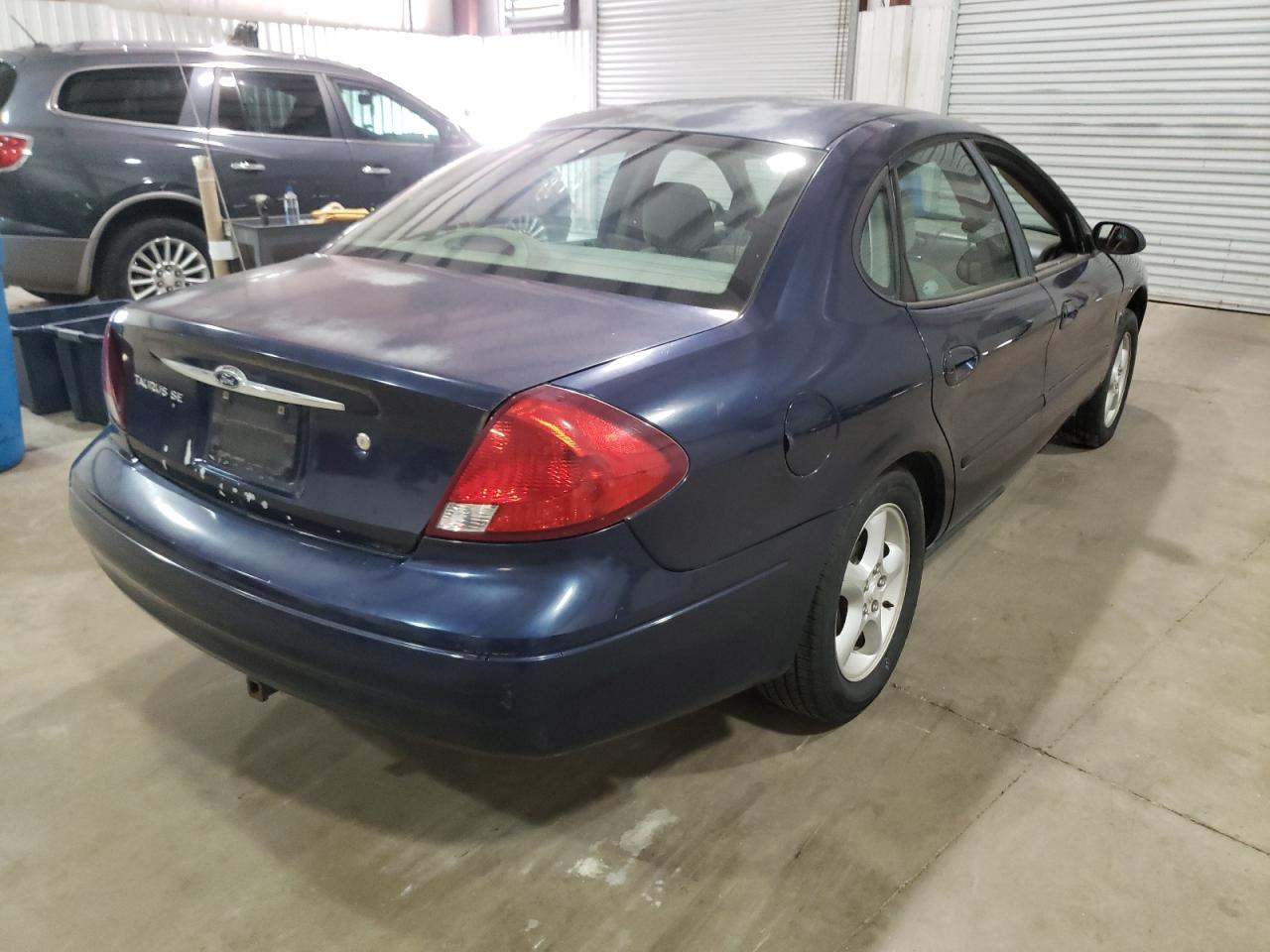 Photo 4 from auction – 2000 FORD TAURUS SES with VIN 1FAFP55S9YA197596