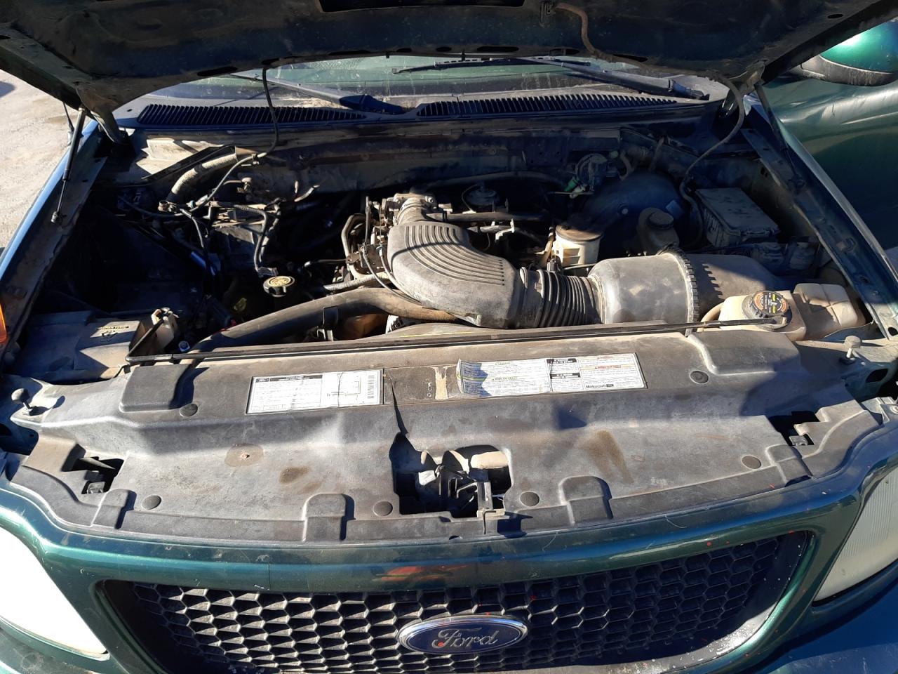 Photo 7 from auction – 1999 FORD F150 with VIN 1FTRX18L6XKB73401