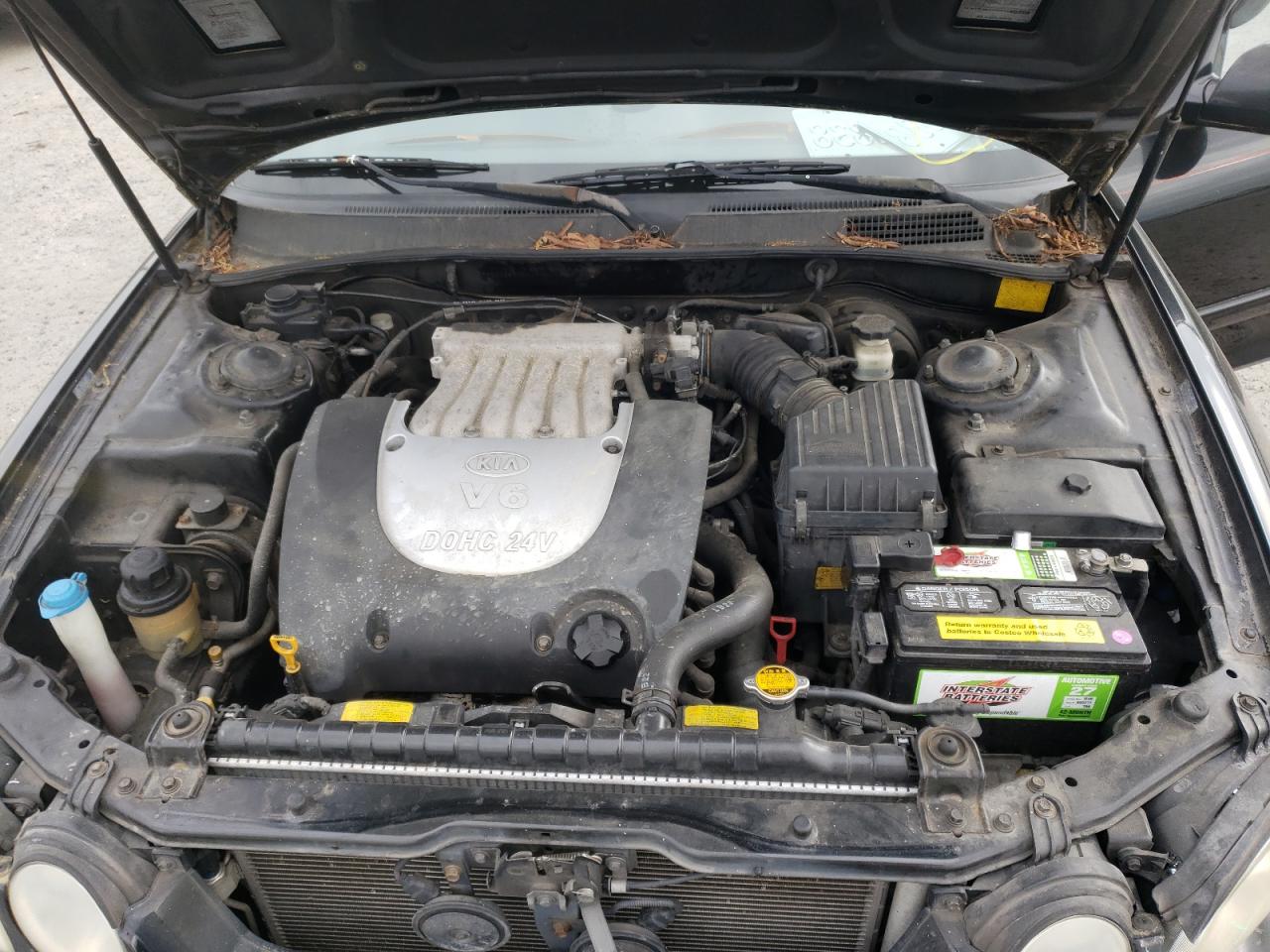 Photo 7 from auction – 2005 KIA OPTIMA LX with VIN KNAGD128355424663