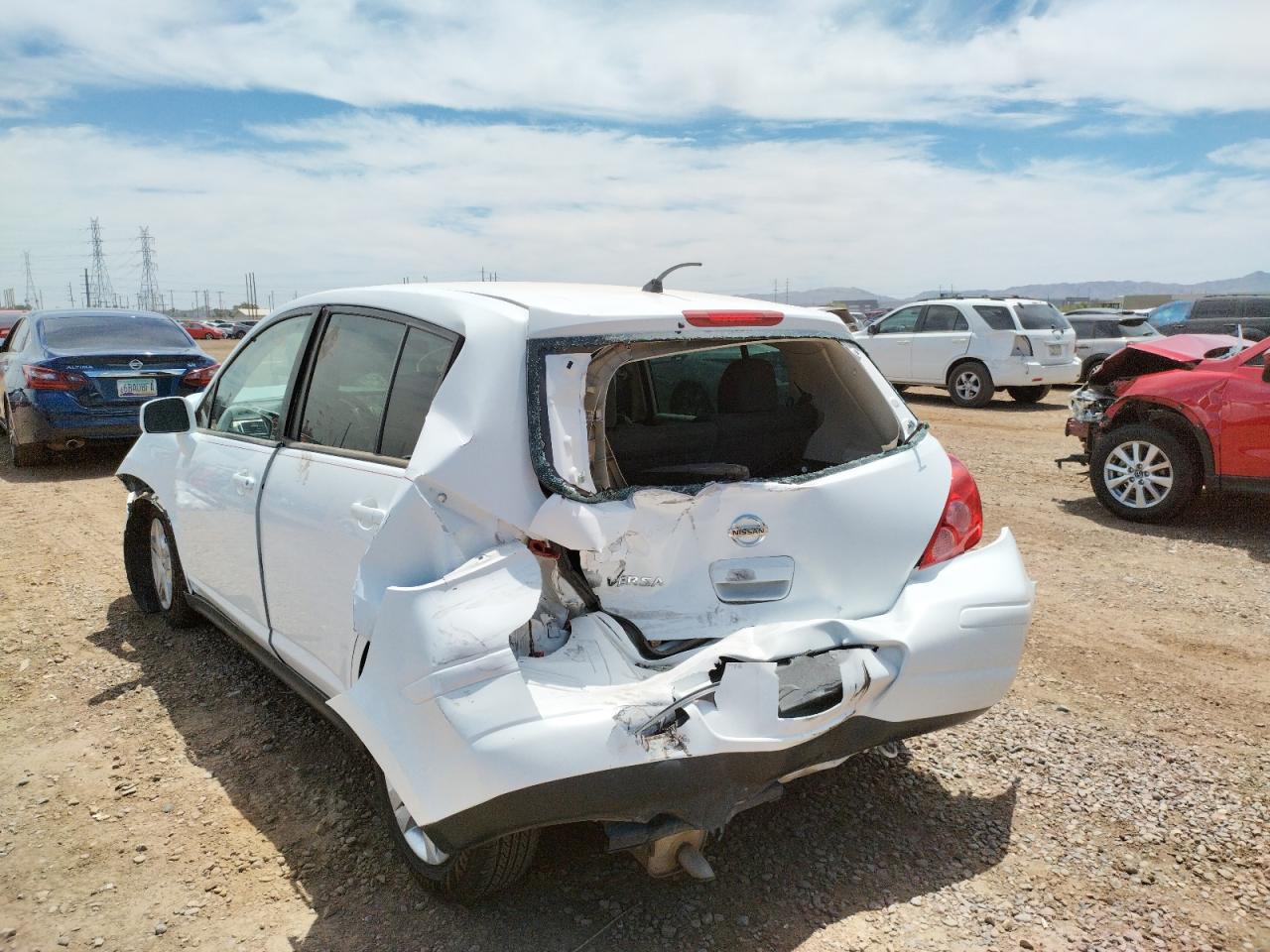 Photo 9 from auction – 2011 NISSAN VERSA S with VIN 3N1BC1CP2BL463748