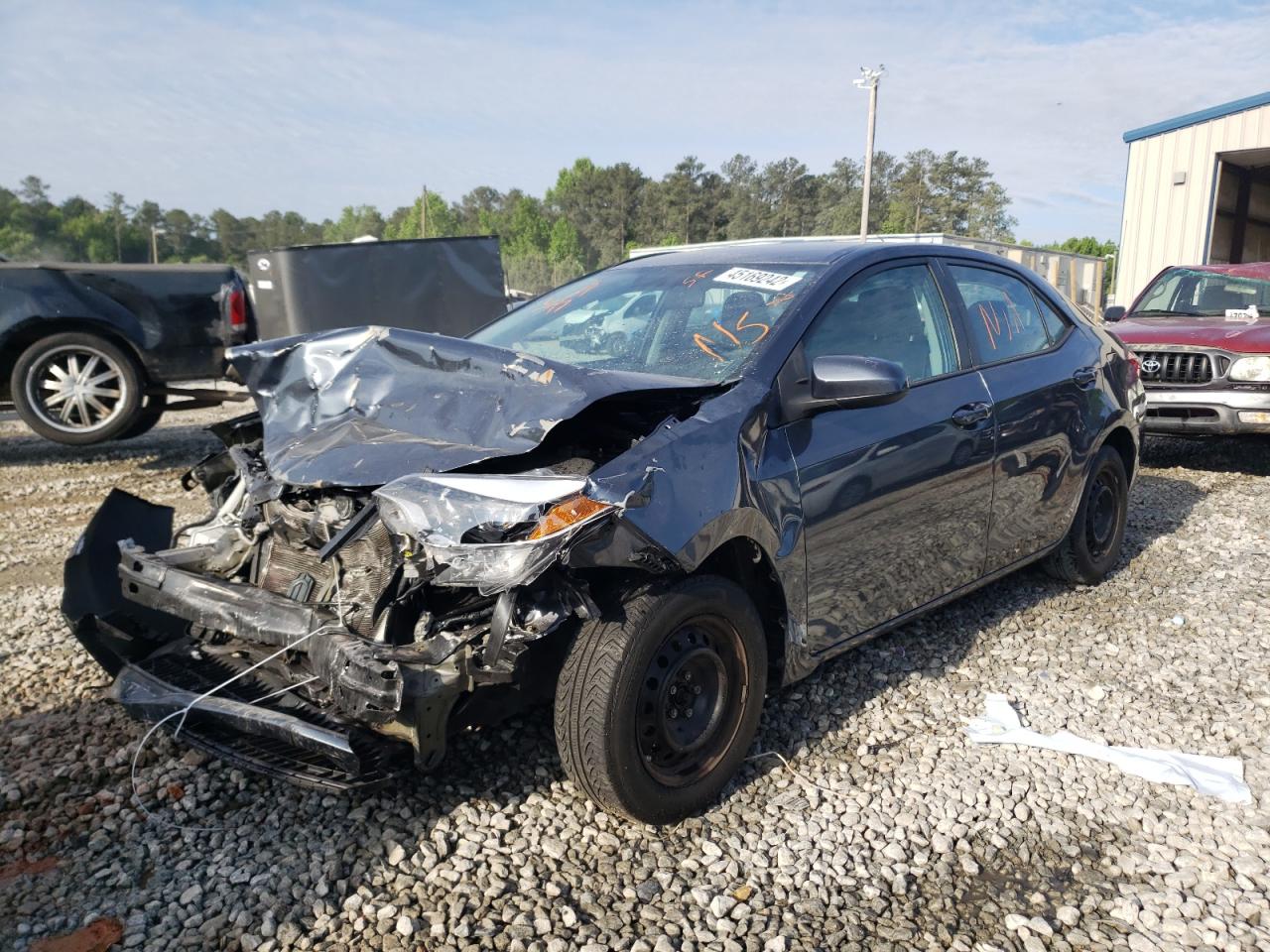 Photo 2 from auction – 2016 TOYOTA COROLLA L with VIN 5YFBURHE7GP500092