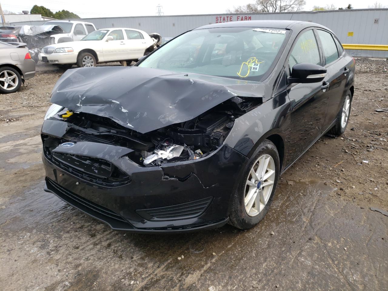 Photo 2 from auction – 2015 FORD FOCUS SE with VIN 1FADP3F21FL247502