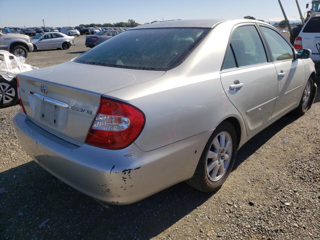 Photo 4 from auction – 2003 TOYOTA CAMRY LE with VIN JTDBE30K530166905