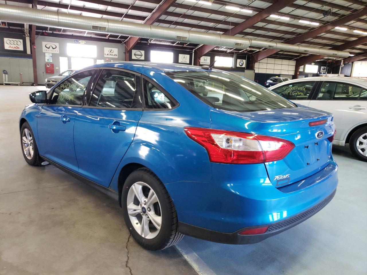 Foto 3 de la subasta – 2013 FORD FOCUS SE con VIN 1FADP3F21DL299645