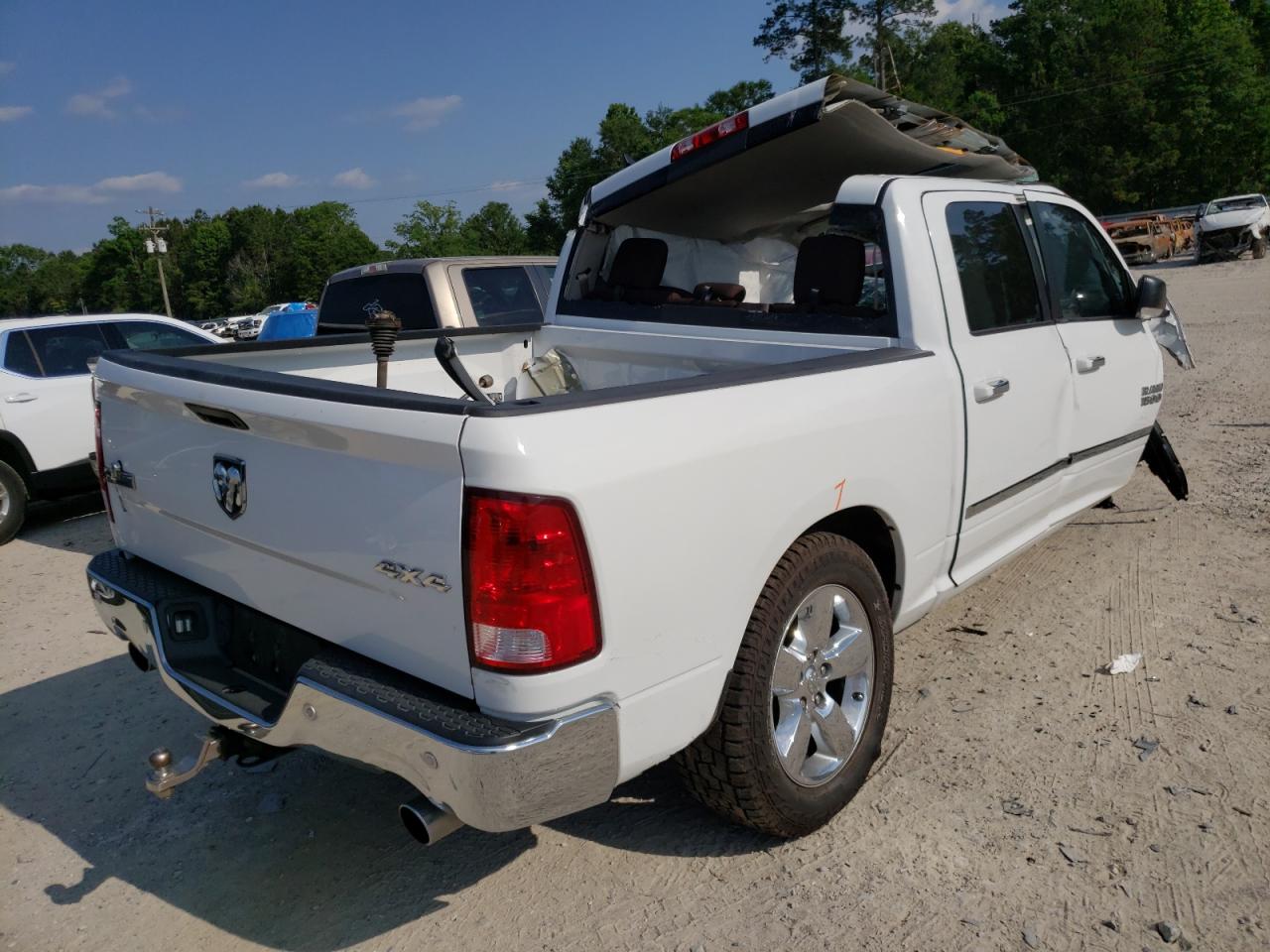 Photo 4 from auction – 2014 RAM 1500 SLT with VIN 1C6RR7LT5ES426832