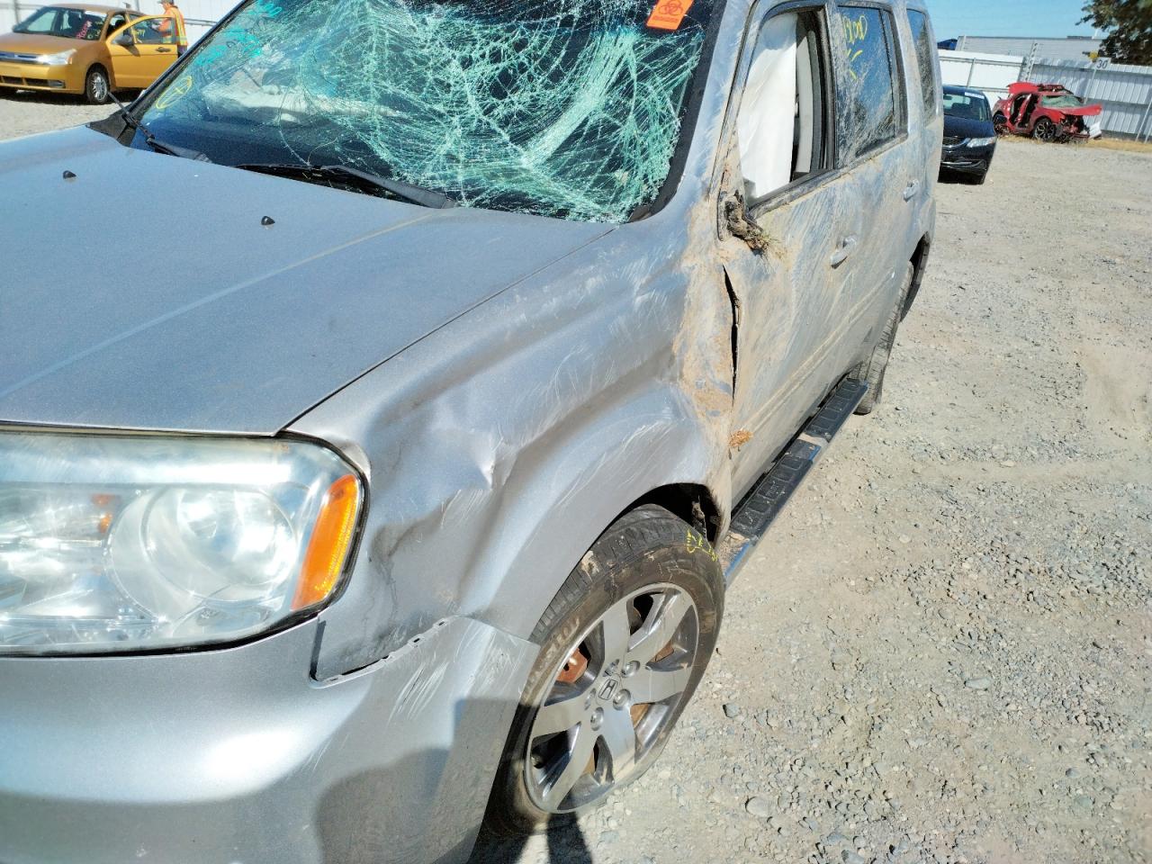 Photo 19 from auction – 2012 HONDA PILOT TOUR with VIN 5FNYF4H95CB042455