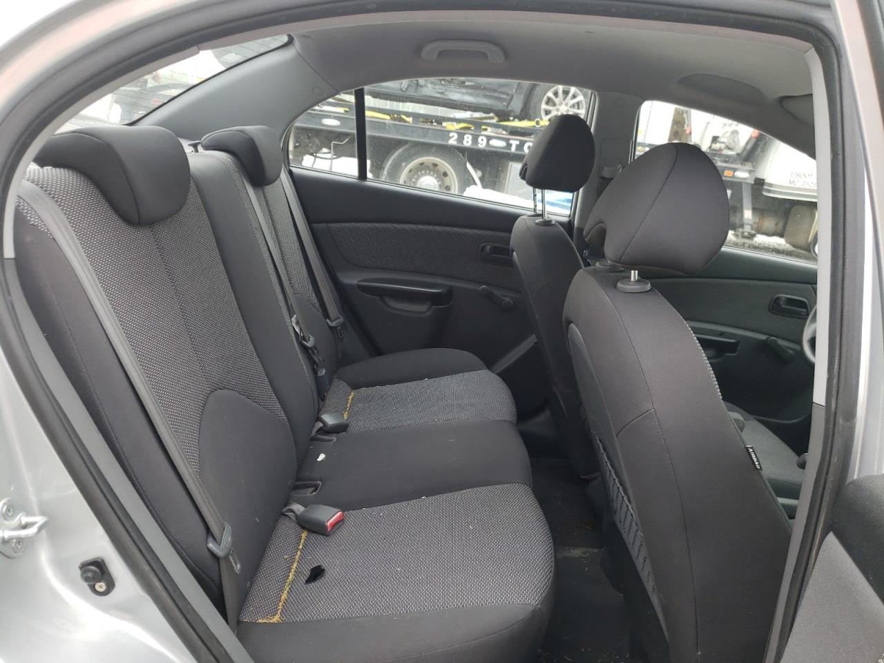 Photo 6 from auction – 2011 KIA RIO BASE with VIN KNADH4A34B6913125