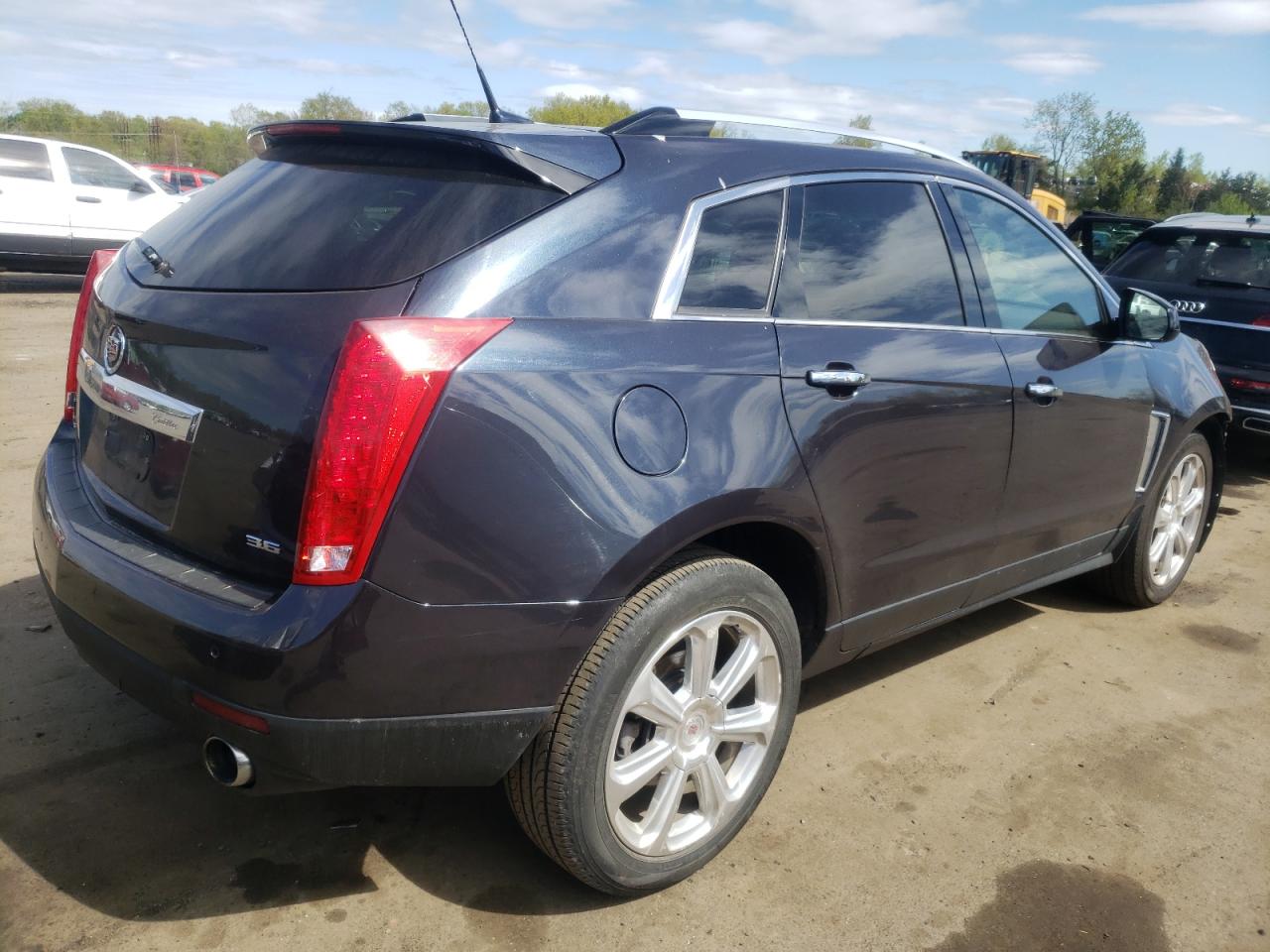 Photo 4 from auction – 2014 CADILLAC SRX PERFOR with VIN 3GYFNFE39ES532164
