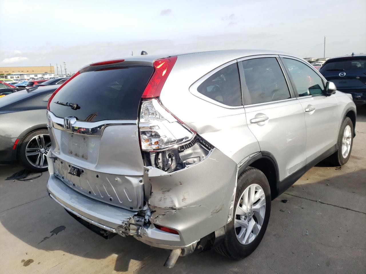 Photo 4 from auction – 2015 HONDA CR-V EX with VIN 3CZRM3H53FG700266