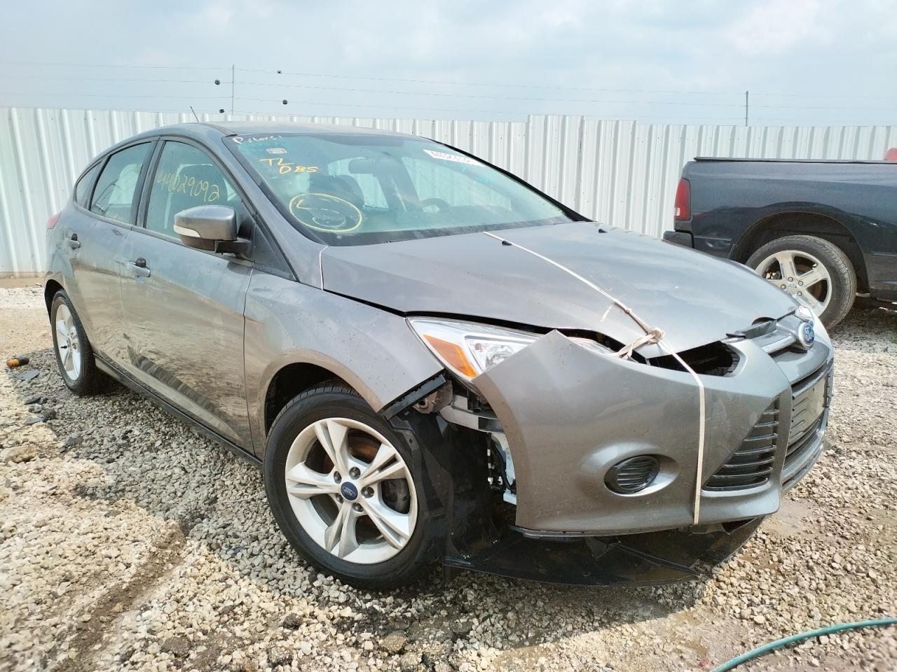FORD FOCUS SE 2014 with VIN 1FADP3K23EL312399 - Photo from auction
