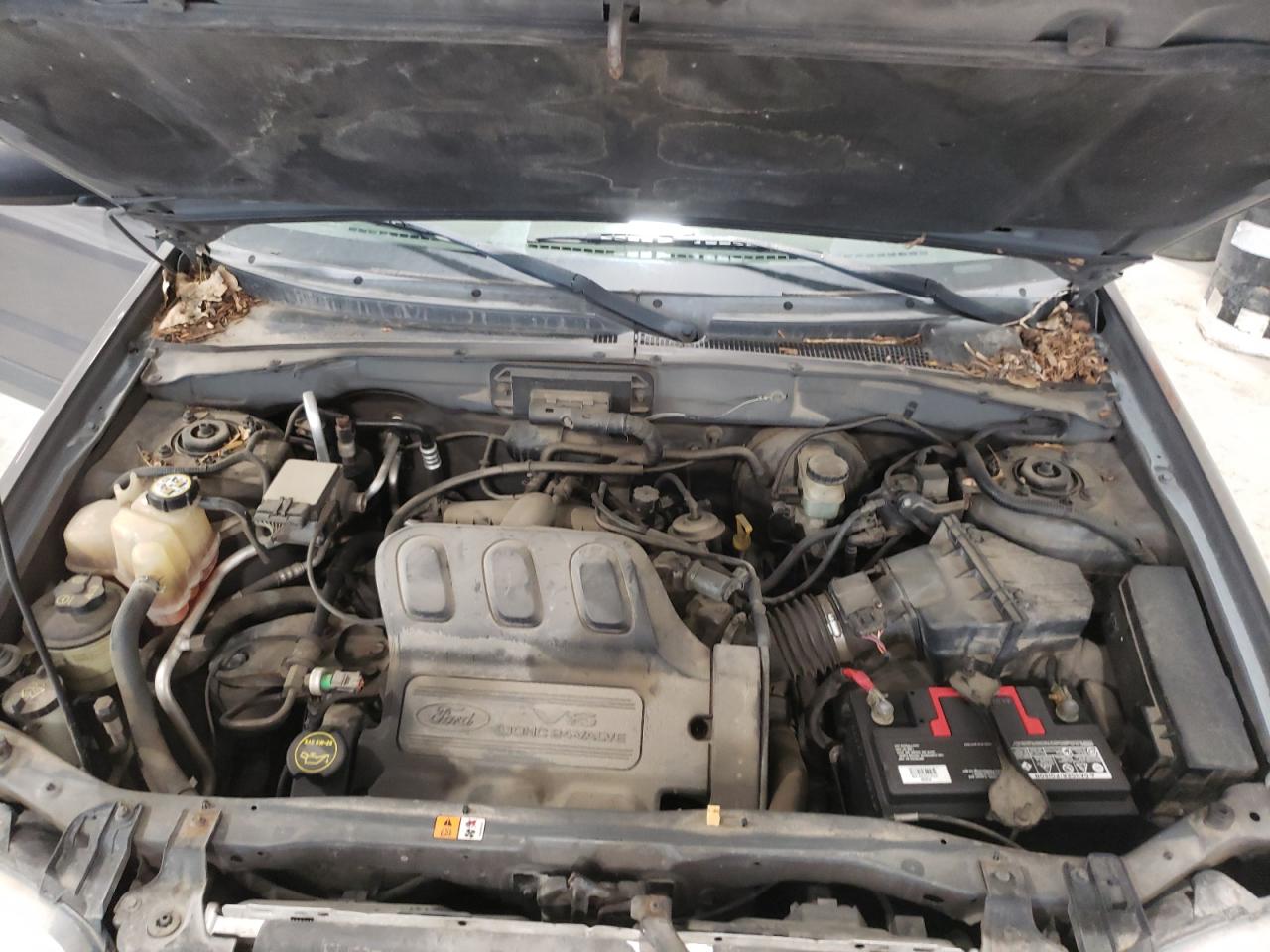 Photo 7 from auction – 2003 FORD ESCAPE XLT with VIN 1FMYU93173KB58730