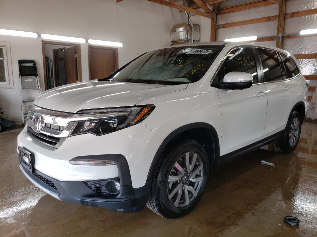 Photo 2 from auction – 2021 HONDA PILOT EX with VIN 5FNYF5H39MB013656