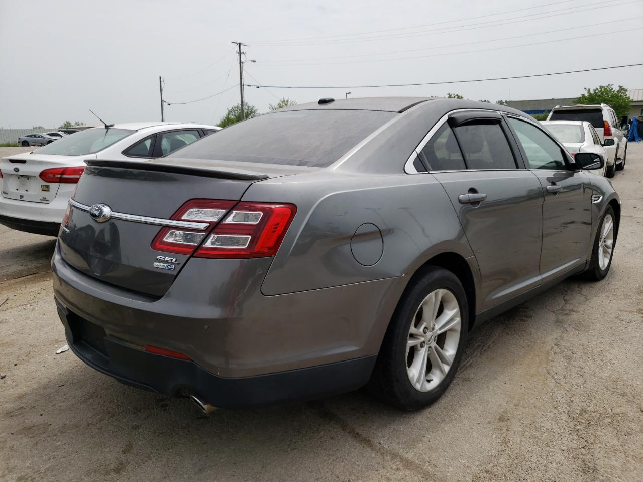 Photo 4 from auction – 2014 FORD TAURUS SEL with VIN 1FAHP2H82EG144982