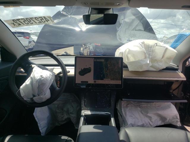 Photo 9 from auction – 2021 TESLA MODEL 3 with VIN 5YJ3E1EB6MF924528
