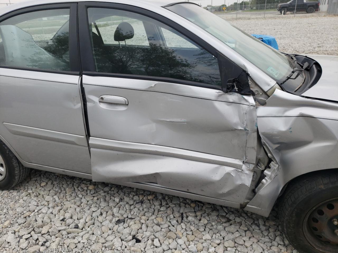 Photo 9 from auction – 2011 KIA RIO BASE with VIN KNADH4A34B6913125
