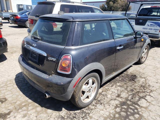 Photo 4 from auction – 2009 MINI COOPER with VIN WMWMF33529TW71297