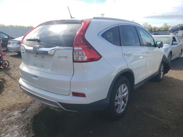 Photo 4 from auction – 2016 HONDA CR-V EXL with VIN 5J6RM4H75GL035298