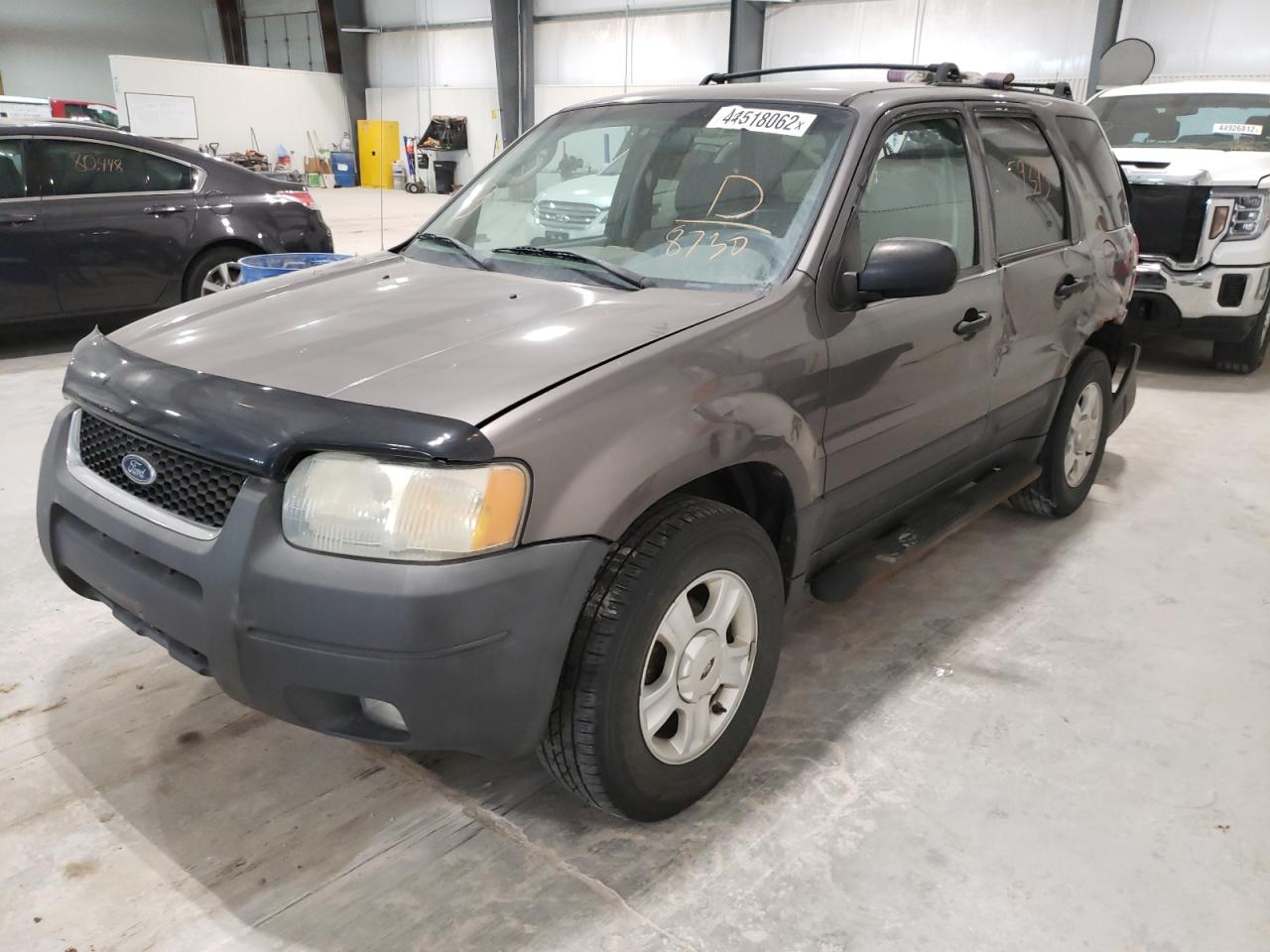Photo 2 from auction – 2003 FORD ESCAPE XLT with VIN 1FMYU93173KB58730