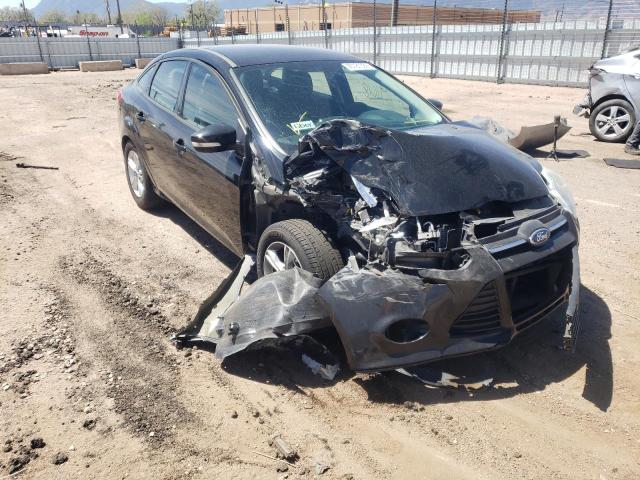 FORD FOCUS SE 2014 with VIN 1FADP3F20EL363823 - Photo from auction