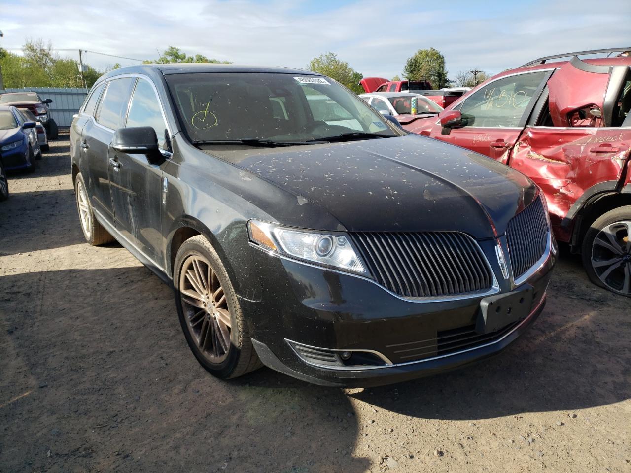 LINCOLN MKT 2014 with VIN 2LMHJ5ATXEBL57908 - Photo from auction