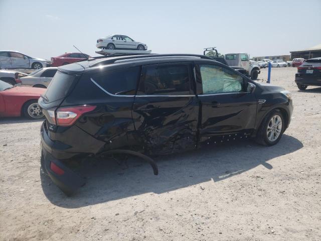 Photo 9 from auction – 2018 FORD ESCAPE SE with VIN 1FMCU9GD8JUB39782