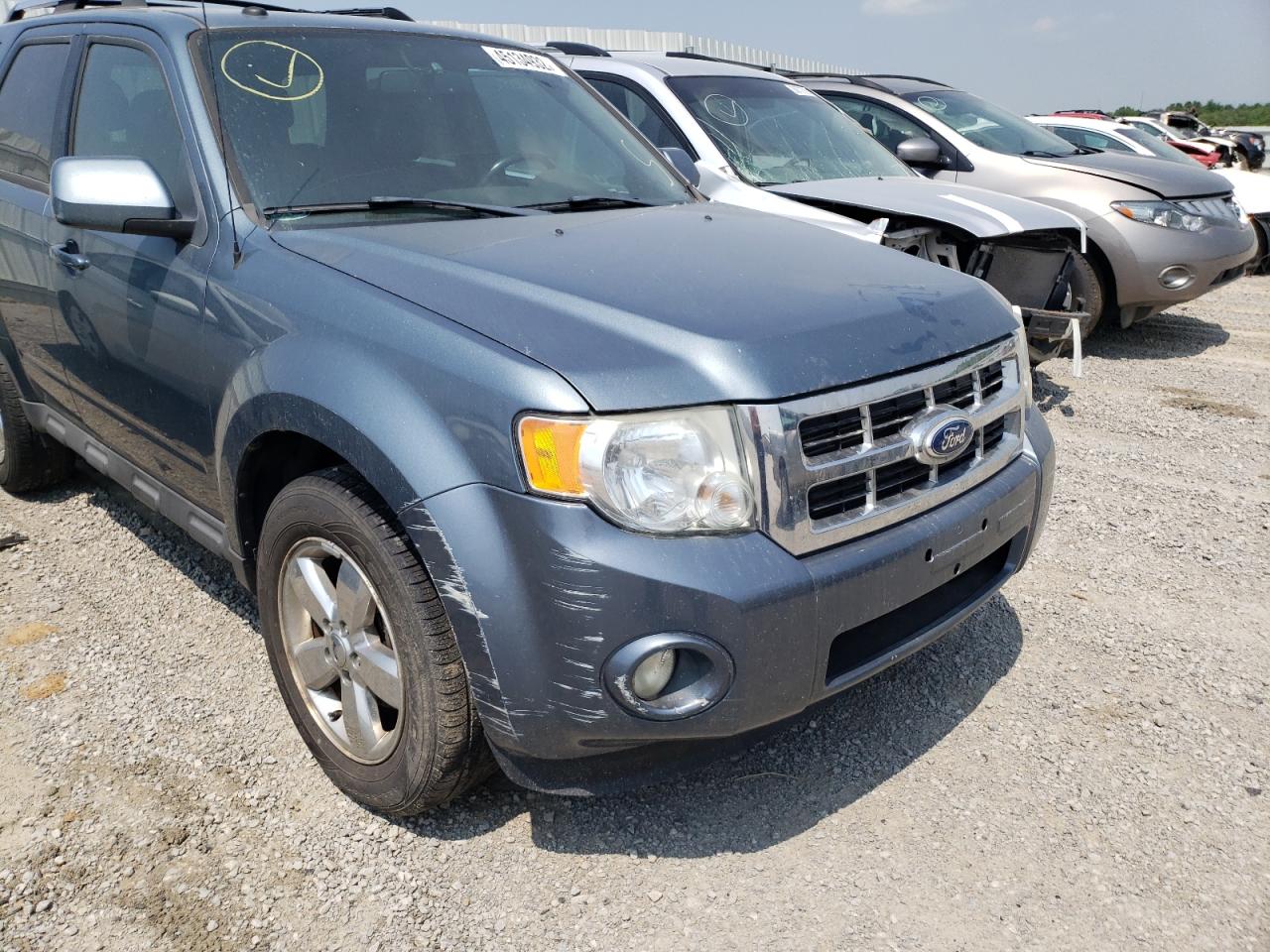 Photo 9 from auction – 2011 FORD ESCAPE LIM with VIN 1FMCU9EG7BKB17878