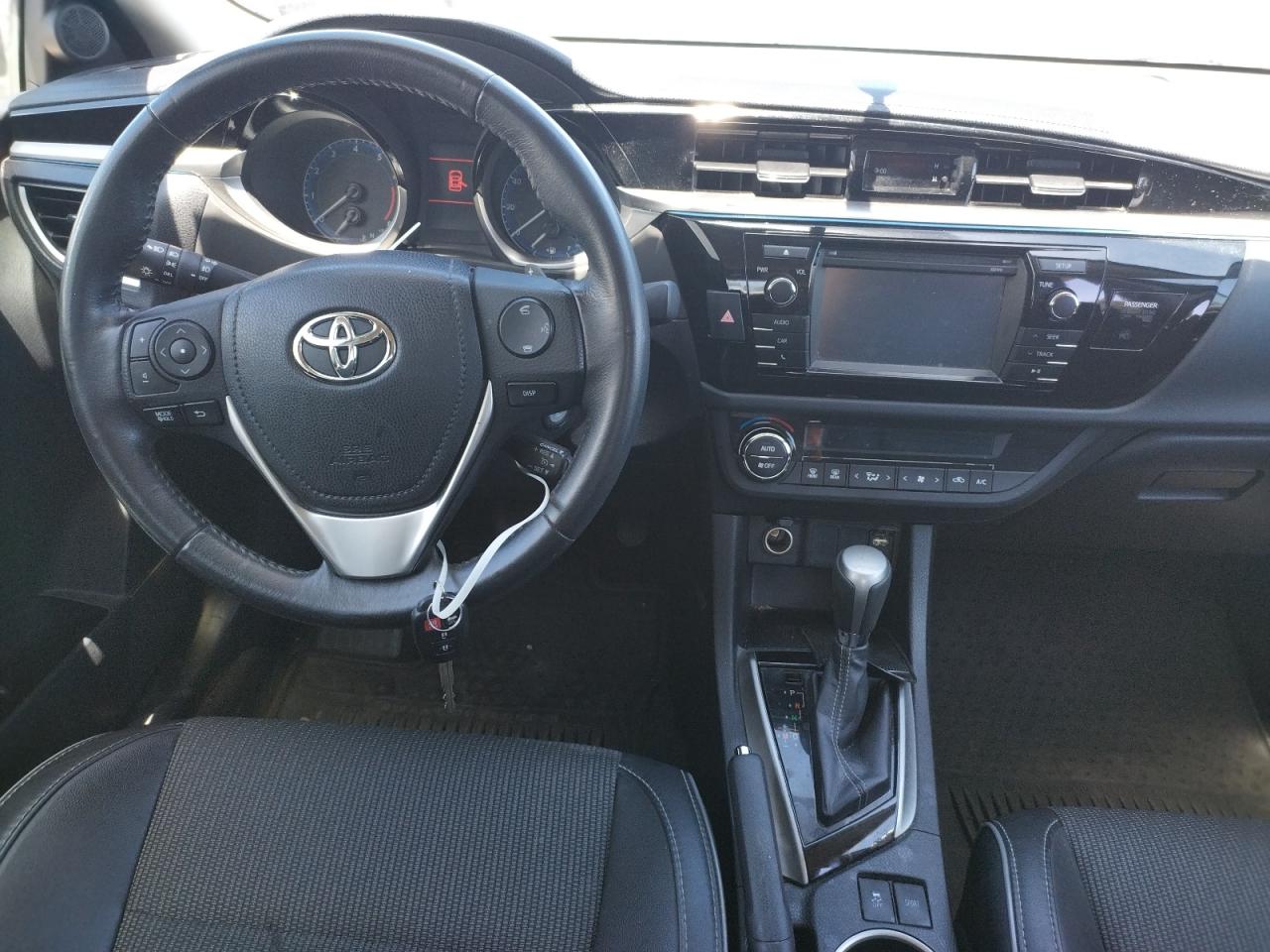 Photo 9 from auction – 2015 TOYOTA COROLLA L with VIN 2T1BURHE9FC393433
