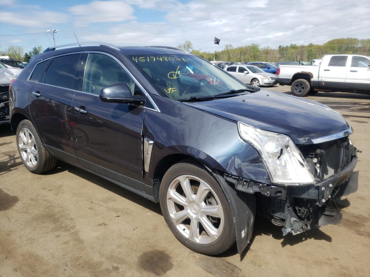 Photo 1 from auction – 2014 CADILLAC SRX PERFOR with VIN 3GYFNFE39ES532164