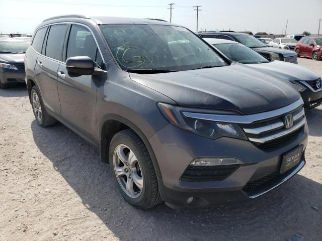HONDA PILOT TOUR 2017 with VIN 5FNYF5H94HB019441 - Photo from auction
