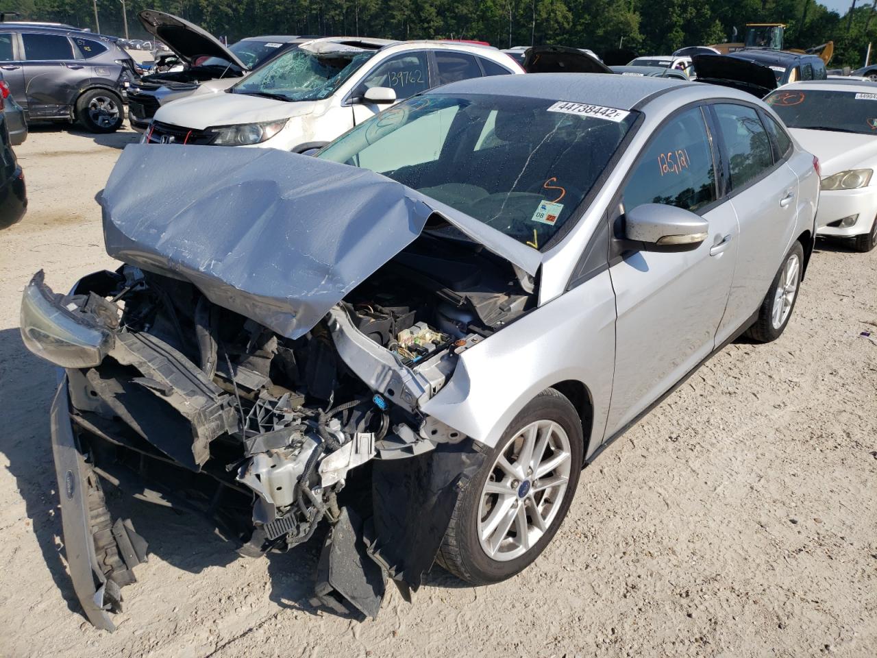 Photo 2 from auction – 2015 FORD FOCUS SE with VIN 1FADP3F28FL354210
