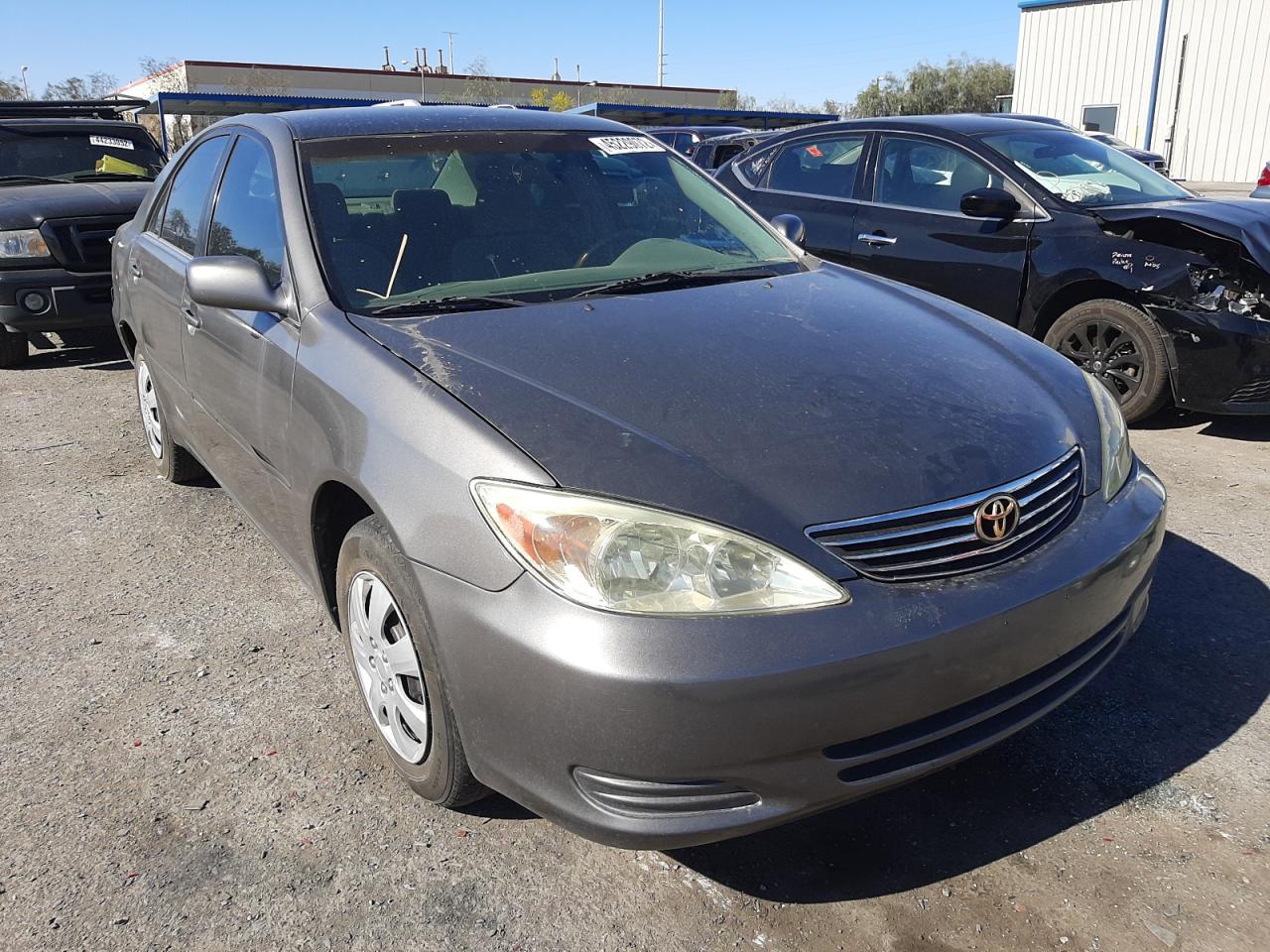 TOYOTA CAMRY LE 2002 with VIN 4T1BE32K22U572012 - Photo from auction